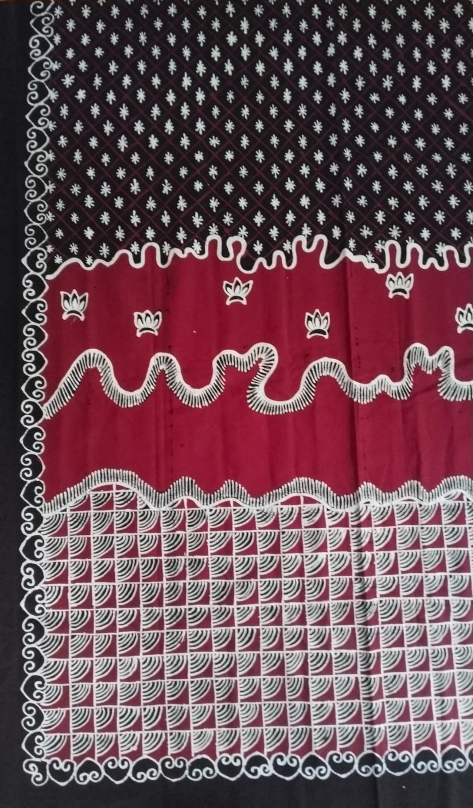 Motif batik tulis bunga Turumtum